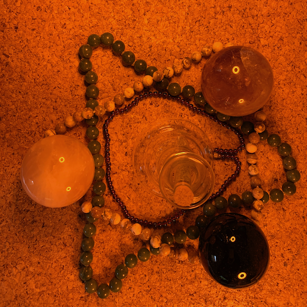 therapeutic gemstone spheres and sphere necklaces in pentagonal geometries with golden PHI ratio harmoniser pendants for client healing