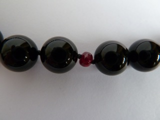 Picture of Ruby with black onyx on either side